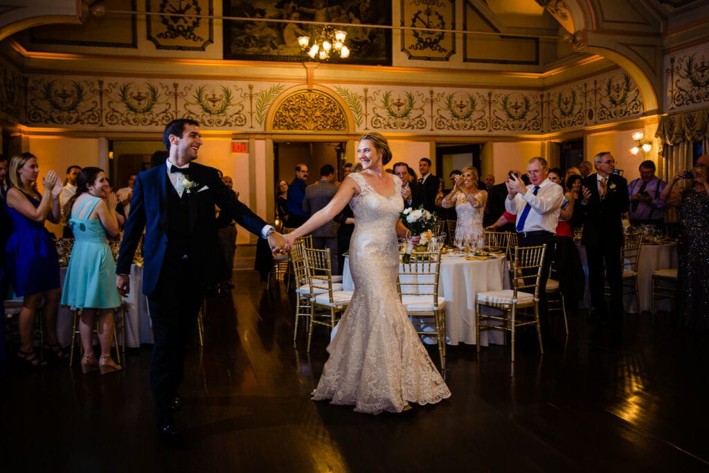 A bride and groom do a choreographed dance for their wedding reception in the roger williams park casino