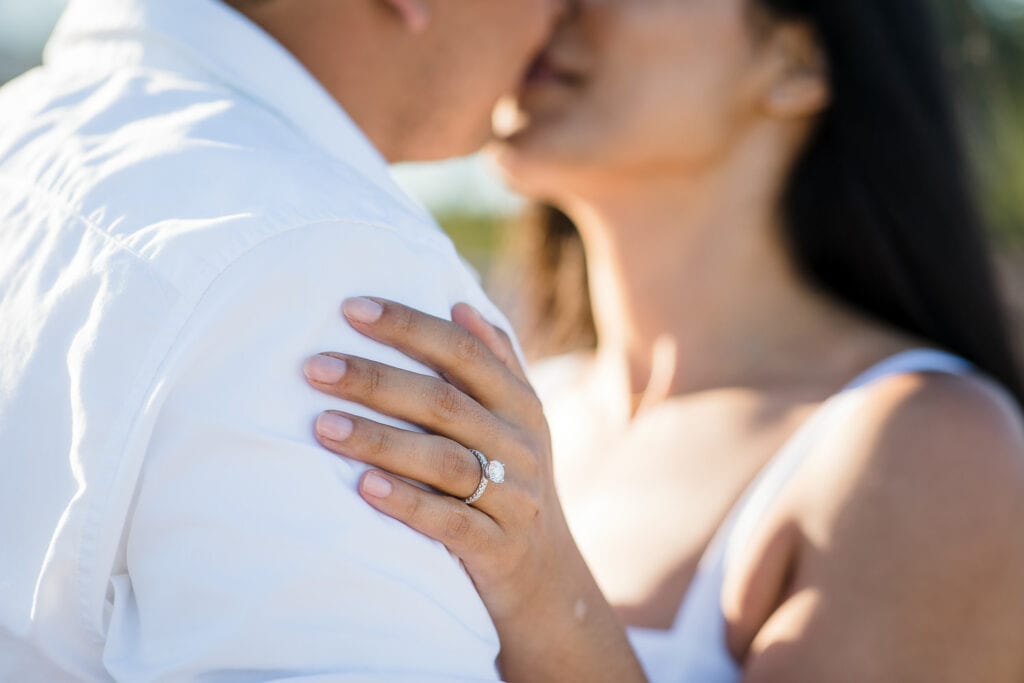 A couple in white at their Ocean House Watch Hill Rhode Island engagement photo session