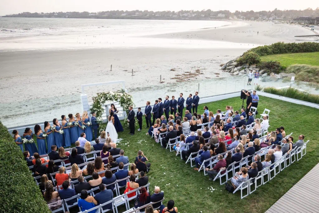 An aerial view of an outdoor wedding ceremony at Newport Beach House a popular wedding venue in rhode island