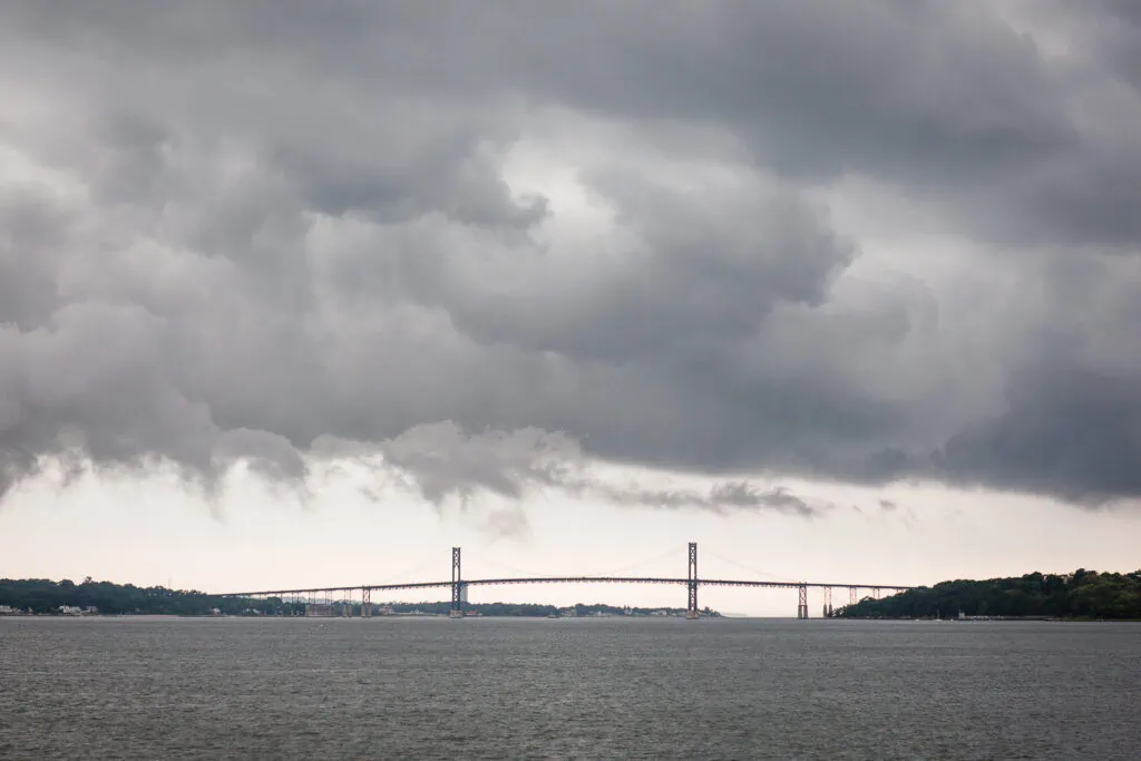 The mount hope bridge under a stormy sky